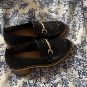 Elegant Black Loafers with Gold Accent